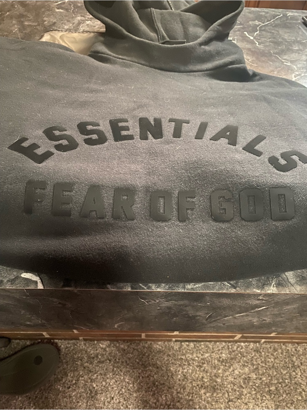 Fear of God Essentials Black Pullover Hoodie with Raised Logo